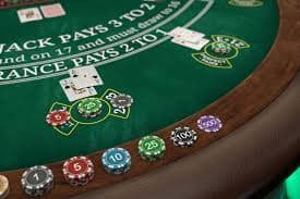 Live blackjack on Microgaming allows real-time bets and chat Live blackjack table with dealer and player cards visible